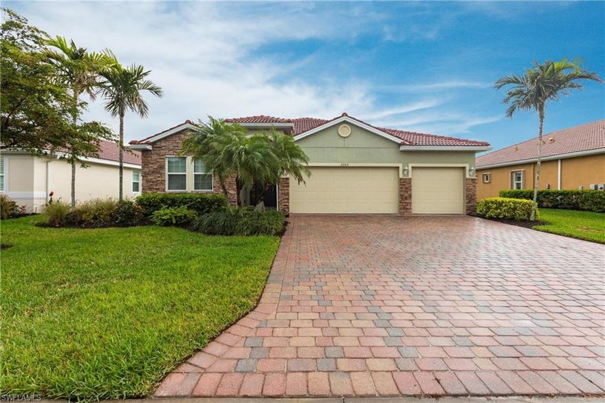 Discover this exquisite home in Sunset Pointe, one of the last hidden-gem gated communities in Southwest Cape Coral. Perfectly situated in a prime location, this home offers easy access to shopping, dining, sports venues, outdoor bars and restaurants, healthcare facilities, banking, and a marina. Enjoy breathtaking water views from your backyard, overlooking the serene lake. This spacious single-story home boasts an open floor plan with elegant tile flooring in the living areas and plush carpet in the bedrooms. The chef’s kitchen is a dream, featuring ample cabinetry, a massive granite island, and plenty of workspace for entertaining. The expansive master suite offers a peaceful retreat, complete with a walk-in closet, a luxurious shower, and a separate soaking tub. The home also includes three additional bedrooms and two more bathrooms, providing plenty of space for family and guests. Step outside to your private screened-in lanai with a paver patio, surrounding a beautiful pool with stunning lake views. Whether you're relaxing or entertaining, this outdoor space is designed for Florida living at its finest. The three-car garage provides ample storage for all your needs, including vehicles, tools, and toys. Don’t miss this rare opportunity to own a piece of paradise in Sunset Pointe!