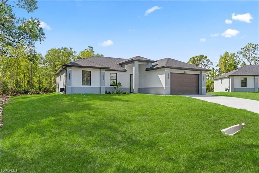 Photo of 373 Selkirk AVE, LEHIGH ACRES, FL 33974 (MLS # 226016834)