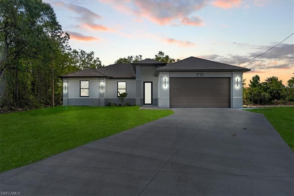 Photo of 373 Selkirk AVE, LEHIGH ACRES, FL 33974 (MLS # 226016834)