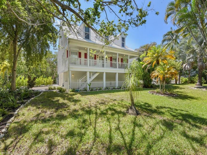 Island living at it's finest! This custom built waterfront home offers not only enough room for every member of the family, but also offers luxury waterfront living with direct access to the beautiful Gulf of Mexico. You will love the Southern charm with open balconies on the front of the home, wood railing on the staircase, gorgeous wood flooring, built-in entertainment center in family room, boardwalk leading to the boat dock, plantation shutters, crown molding, lush tropical landscaping, and impact windows and doors and roll down shutters. All bedrooms are on the third level with two of the bedrooms having private entry to a screened balcony that overlooks the canal. The massive screened lanai that sits off to the side of the home offers wonderful outdoor living space and features a large heated pool with integrated spa. Castaway Estates is a non-gated deed neighborhood that is perfect for those who love to spend time on the waterways of SWFL.