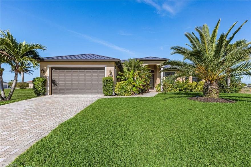 This stylish single-family home offers everything you could wish for in comfortable living or a highly attractive investment opportunity. Ideally located on the wide freshwater canal, the property boasts stunning views and a private heated pool—perfect for enjoying Florida living all year round. The home is offered fully furnished and is move-in ready, making it ideal for immediate occupancy or as a turnkey rental investment. It has been very well maintained and features high-quality finishes throughout, including elegant travertine flooring in the main living areas and beautiful wood flooring in the bedrooms. A standout feature is the brand-new, high-quality metal roof installed in 2023, providing durability and peace of mind for years to come. The property includes 3 spacious bedrooms and 2 bathrooms with a functional and inviting layout. A billiard table is also included, adding a fun and luxurious touch to the home. The outdoor area is designed for relaxation and entertainment, featuring a covered and fully screened lanai along with the pool area for added comfort and privacy. A well-maintained beautiful garden with palm trees surrounds the house.
Whether you are looking for a primary residence, a vacation home, or a profitable investment property, this home combines location, quality, and lifestyle in one exceptional offering.
