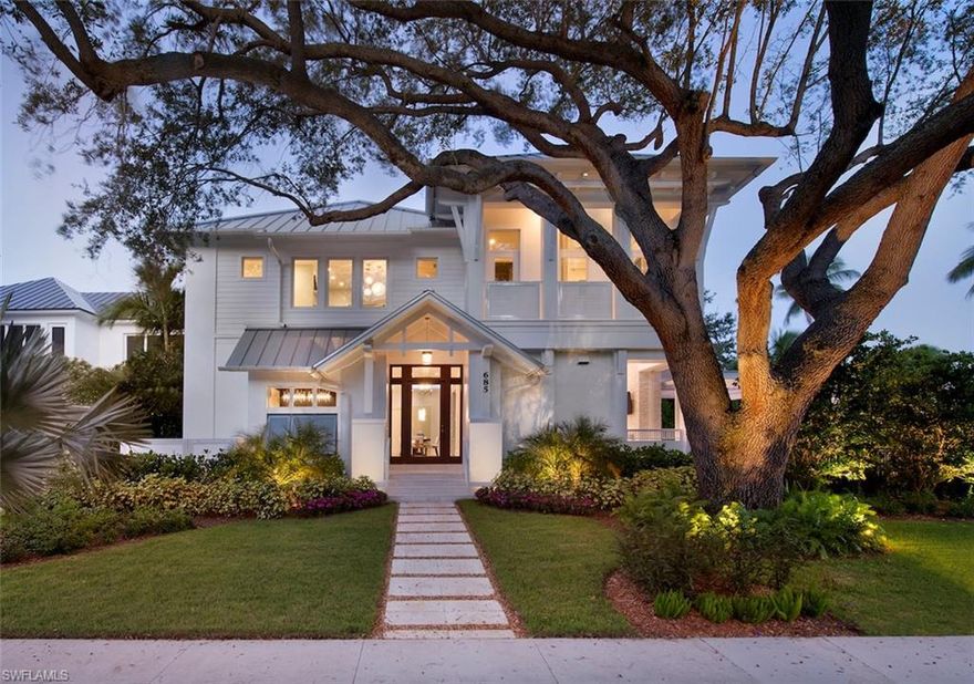 A block from the beach and 2 blocks to town, Dreamhouses of Old Naples and MHK Architecture present a rare opportunity to enjoy the relaxed lifestyle of Olde Naples in the splendor of an exceptionally luxurious, newly constructed modern masterpiece. This timeless classic has it all! Location, couture finishes and a dynamic open floor plan perfect for entertaining. Bespoke appointments include: a wine feature wall, private office, 2 family rooms, 1st floor Master Suite with 4 additional en-suite bedrooms, private balcony, outdoor kitchen/fireplace and a sun drenched spa-like oasis that rivals a 5 star hotel. Extensive use of natural stone throughout, Legno Bastone French white oak floors, Control 4 smart house, Sub-Zero/Wolf appliances and some of the highest end custom cabinetry offered on the market. All the must-haves are here. Fully furnished and decorated by Broad Avenue Designs. Nothing on the market compares to this "one of a kind" property.