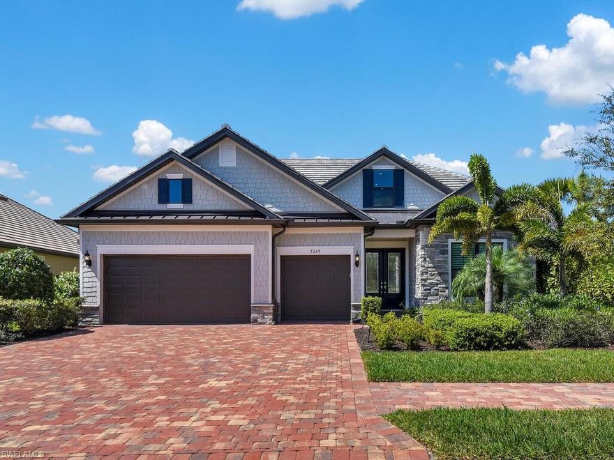 Rare to find, this light-filled 2-story Stonewater model offering 4 bedrooms, den and 4.5 baths on a pie shaped waterfront lot in the highly desirable gated community of Winding Cypress in Naples. This home has been upgraded to include all available options totaling over $650,000 including 2nd floor loft, hurricane windows and doors, upgraded finishes throughout including smooth drywall, seamless porcelain floors, plantation shutters, California Closets, lanai with outdoor gas grill, pool bath, in house water-purifying system, Storm Smart shutters, screened in saltwater lap pool and extended finished 3 car garage.
 
The open-concept design features a spacious great room where the living, dining, kitchen and den/office areas flow together effortlessly. The gourmet kitchen is a true centerpiece with top-of-the-line appliances, ample cabinetry, and generous workspace and pantry to satisfy any home cook or entertainer. A comfortable primary suite on the main level and two flexible guest suites provide excellent privacy for owners and visitors alike.
Upstairs loft offers flexible space for living, office, or hobbies, and includes a beverage center plus a fourth bedroom and bath.
 
The expansive screened lanai with peaceful lake view creates an ideal setting for year-round indoor-outdoor living and entertaining. 
 
Located in one of Naples’ most sought-after resort-style communities, residents of Winding Cypress enjoy a clubhouse, restaurant, resort pool, fitness center, tennis, pickle ball, bocce, dog park, and miles of walking trails. Just a short drive to beaches, boating, dining, and shopping, this home is perfect for full-time living or a luxurious seasonal retreat.