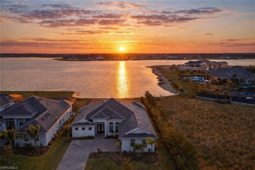 Priced to sell, this exceptional Iris Model offers one of the largest lakefront lots and most breathtaking water views in WildBlue, presenting a rare opportunity to buy low and customize to your taste. Located at 18789 Wildblue Blvd in the prestigious WildBlue community of Fort Myers, this 2022-built residence sits on an oversized half-acre lot with sweeping, unobstructed lake views and features 4 bedrooms, 3 baths, and nearly 3,000 sq. ft. of thoughtfully designed living space. The open-concept floor plan includes a gourmet kitchen with a large center island, a formal dining room, and seamless indoor-outdoor living ideal for entertaining. The private outdoor oasis showcases an upgraded pool and spa, an expansive screened lanai with an 8-foot extension, lush privacy landscaping, and the rare advantage of direct lake access from a private cove, perfect for boating, fishing, kayaking, or paddle boarding. Additional highlights include impact-resistant windows and doors, a whole-house water filtration system, and a spacious 3-car garage. Residents of WildBlue enjoy world-class, resort-style amenities including a lakeside clubhouse with fine dining, fitness center and spa, tennis and pickleball courts, and an unmatched water-sports lifestyle. This is a rare chance to own a move-in-ready luxury lakefront home in one of Southwest Florida’s most desirable communities. Bring all offers. Owner says SELL. Photos with furnishings are virtually staged.