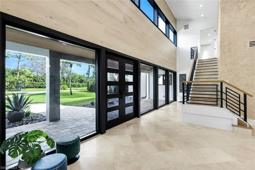 Photo of 13087 Pond Apple DR E, NAPLES, FL 34119 (MLS # 225072672)