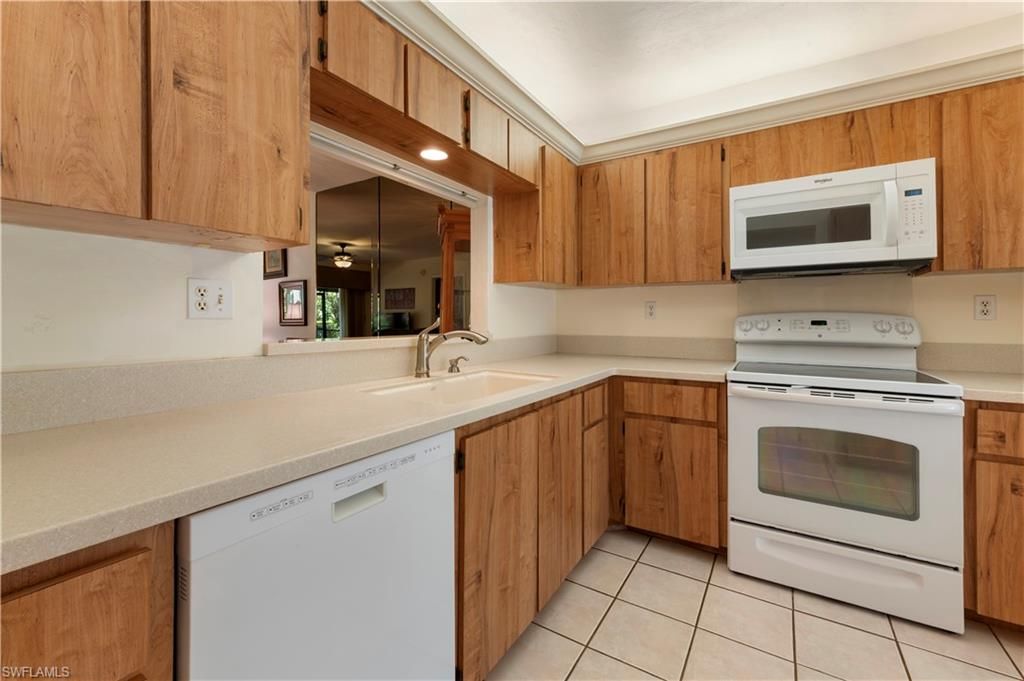 Photo of 1822 Kings Lake BLVD #102, NAPLES, FL 34112 (MLS # 226010161)