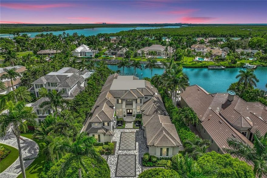 Meticulous attention to design and detail Port Royal Community estate. Seamless inviting confluence from indoor to outdoor spaces for entertaining and resort style relaxation.  Wine cellar,  first floor primary with smart technology glass, outdoor barbeque kitchen, infinity edge pool and spa, elevator, integrated Lutron smart home audio and visual, 3 observatory balconies, mini putt putt, car enthusiast 8 car design garage, fountain water pads, lush private landscaping, boat dock with lift and direct gulf access. Naples finest address with exquisite bespoke finishes throughout. Sale price reflects items conveyed with home.