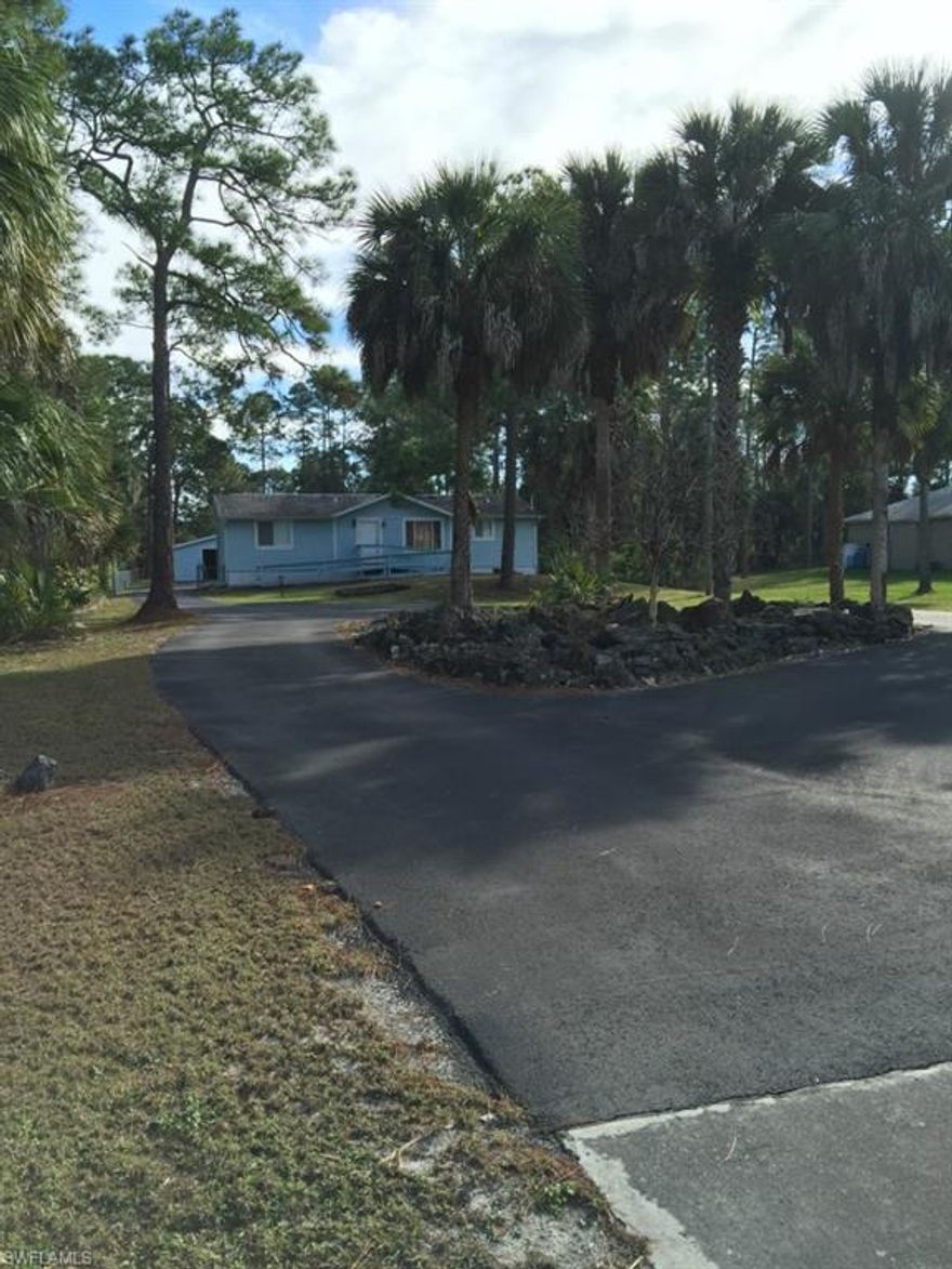 HUGE PRICE REDUCTION!!Highly Motivated Seller!! Value loaded home with lots of extras; beamed vaulted ceilings, tiled kitchen with newer range & track lighting, separate dining area, split bedroom plan, plus a detached 2 car garage, fenced yard, plus large deck & ramps (suitable for the handicapped onto & off the house) & more! Easy to show anytime. Call and don't let this one get away.