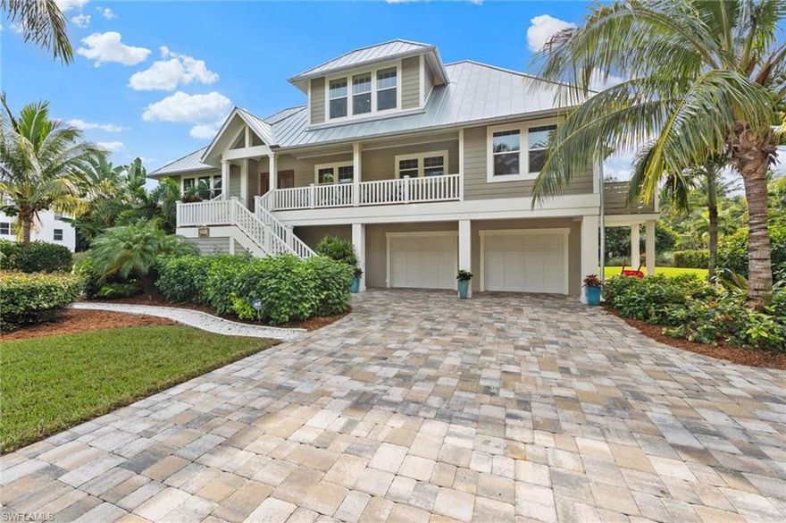 Spectacular "Old Florida", 3 BR/3.5 BA, 2016 custom beach home. Located in Captiva's "Village" just steps from the sugar sand & shell strewn beaches of the Gulf of Mexico. Built with the highest standards in mind this house is incredible inside & out. Hardie-board siding, all impact windows & doors, whole house generator, Azek trim & decking. Heated, fenced sport pool. Lanai w/ new no-seeum screen & exterior wired speakers. Custom millwork includes cabinetry, pickled cypress feature walls, handmade fireplace mantle, Ash wood floors, Oak stairs & Boral v-groove ceilings through exterior & interior. Chef's kitchen, top-of-the-line appliances, granite counters, built-in buffet in dining room w/wine refrigerator & 3-stop elevator. Office w/built-ins & futon. Primary suite has private sitting area, 2walk-in closets & French doors to the lanai. Primary bathroom has a whirlpool tub, double vanities and walk-in shower. Golf cart garage & 2-car garage with epoxy floors. Nothing but the BEST!