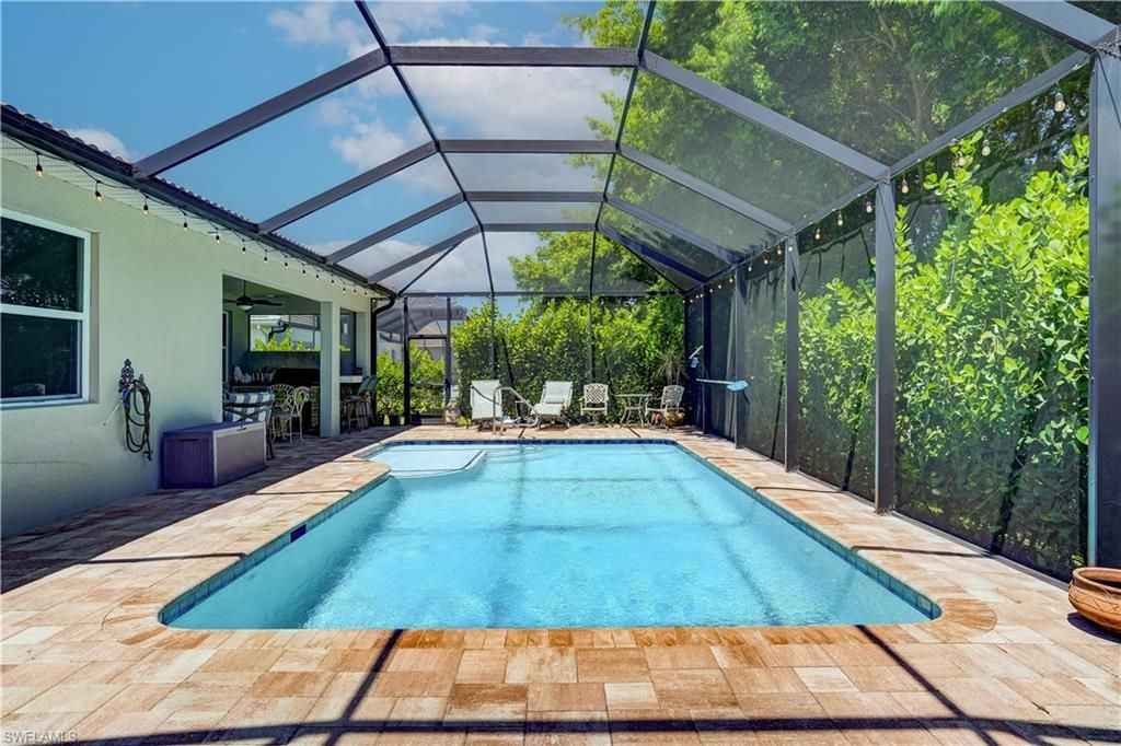Photo of 18456 Royal Hammock BLVD, NAPLES, FL 34114 (MLS # 226017830)
