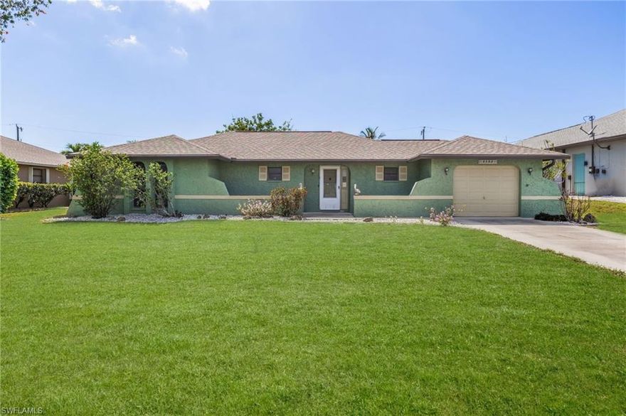 What an affordable opportunity for home ownership in SW Cape Coral. Newly painted exterior. Lanai you'll want to spend hours on. Backyard is large, great for so many ways of enjoyment and you have the room for a pool if you'd like. Peace of mind with concrete block construction, newer roof and A/C,  tile floors, and a cute courtyard. Lanai screens are new as well as the ceiling fans. Plenty of room and an amazing neighborhood,  Come tour it and begin the process of making it your next home, before someone else does!