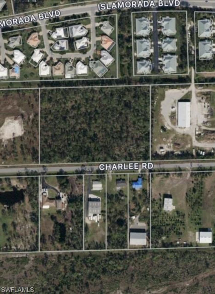 Prime 5-Acre Development Opportunity in Punta Gorda – Build Your Dream Home or Subdivide for Profit!
Unlock the potential of this premium 5-acre parcel on Charlee Road, just off Burnt Store Road in the vibrant Punta Gorda area. Nestled next to the renowned Burnt Store Marina, this prime land offers a golden opportunity for developers and homebuilders alike.

Key Features:

Expansive and Flat: This spacious, flat lot is perfect for custom home construction or subdividing into smaller parcels.
Strategic Location: Adjacent to Burnt Store Marina, enjoy access to a prestigious 27-hole golf course, fine dining, and full Gulf access with ample boating storage.
Zoned for Flexibility: Zoned AG-2 (Agricultural and Low Density Residential), allowing for residential development with an emphasis on maintaining an agricultural charm.
Subdividable Potential: Transform this large parcel into a thriving residential community or preserve its unique agricultural character by subdividing into smaller lots.
Accessible Frontage: Benefit from full frontage on a public, paved road, ensuring easy access for future development.
Utilities: Electric lines are nearby.
Seize this rare opportunity to develop a sought-after location in Punta Gorda! Whether you envision a luxurious custom home or a dynamic new residential project, this versatile land offers the perfect canvas. Act now to make your mark on this exceptional property!