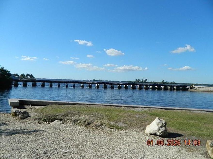 Build Your Dream Home: River Views & Boat Access at Your Doorstep!
Imagine waking up to the serene beauty of the Caloosahatchee River every single day. This is your rare opportunity to own a premier, cleared homesite in a location that perfectly blends tranquility with an active lifestyle.
Key Features:
Stunning River Views: Enjoy sweeping vistas of the wide Caloosahatchee River from your future front porch.

Ready to Build: This vacant lot is already cleared and leveled, saving you time and money on site preparation.

Boater's Paradise: Located directly across the street from Russell Park, you have immediate access to a public boat launch. Spend your weekends on the water with ease!

Prime Location: Nestled in a peaceful, established neighborhood while remaining close to local dining, shopping, and major roadways.

The Lifestyle:
Whether you’re an avid fisherman, a sunset seeker, or someone looking for the perfect backdrop for their custom-built masterpiece, this lot delivers. Russell Park acts as your extended front yard, offering green space and recreational convenience.