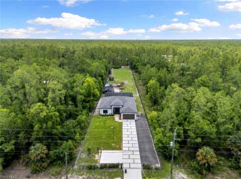 Photo of 4473 Golden Gate BLVD E, NAPLES, FL 34120 (MLS # 226023088)