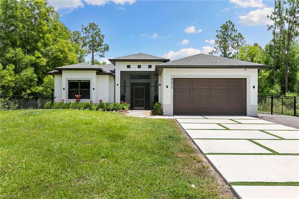 Photo of 4473 Golden Gate BLVD E, NAPLES, FL 34120 (MLS # 226023088)