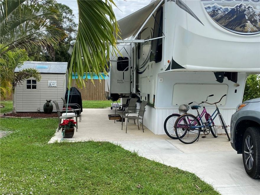 Pet Lot with 2013 Heartland Big Horn Silverado. Shed included with washer/dryer.