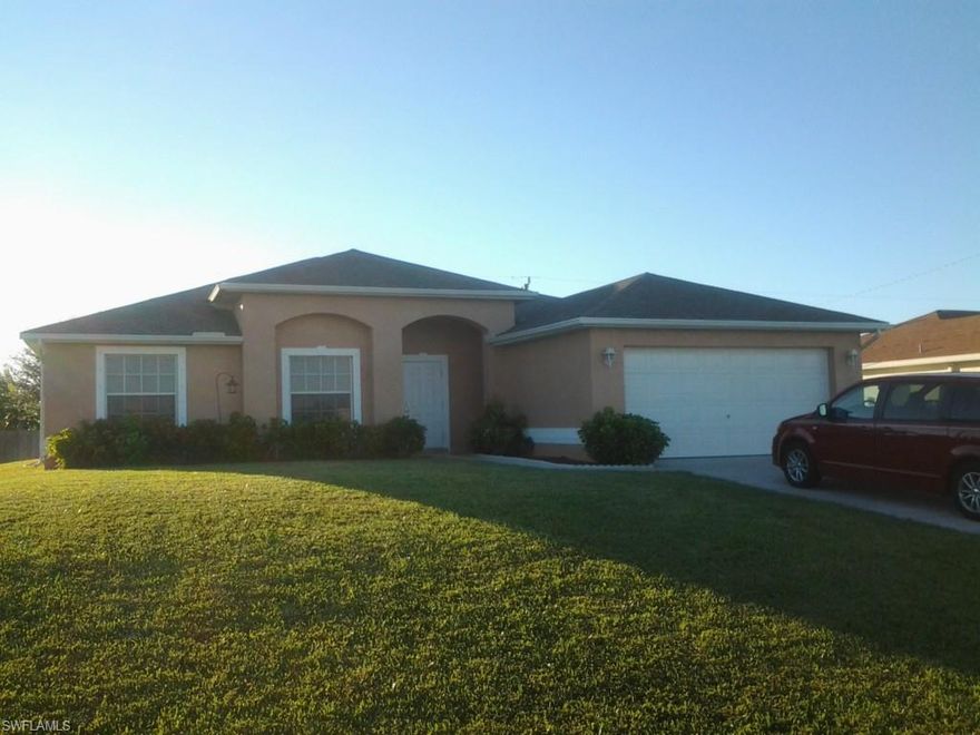 **** IMMACULATE ****  Gorgeous 3 bedroom, 2 bath home.  Split floor plan.  Large, new tile throughout.  Large screened lanai with tile floor.  Freshly painted inside and outside.  Kitchenette and living room light fixtures are high-end and convey.  Complete irrigation system with Floratam sod. Nicely landscaped. Hurricane shutters included.  Oversized master bath has walk-in shower, garden tub, and separate commode area.  Bonus room/den is oversized and is currently used for entertainment room.  Home is close to shopping areas and parks.