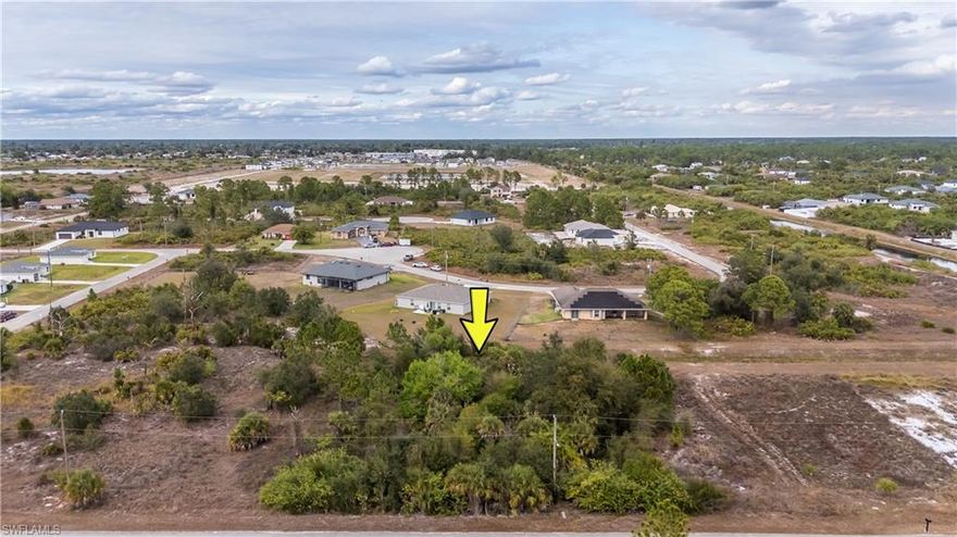 Discover a great opportunity to build your custom home in the growing community of Lehigh Acres, FL. This buildable residential lot is zoned for a single-family home, offers an ideal balance of space and privacy, and is not located in a flood zone, providing added peace of mind.

Set in a quiet neighborhood, this parcel is well suited for a full-time residence, seasonal retreat, or long-term investment, with plenty of room to bring your vision to life.

A key feature of the property is its north-facing rear exposure, a highly desirable orientation for buyers planning to add a pool. In addition, the rear easement creates a buffer between the backyard and neighboring properties, offering extra privacy and an open feel.

While the setting feels peaceful, the location remains convenient—just 4 minutes to Dollar General, 4 minutes to Mirror Lakes Elementary School, 7 minutes to East Lee County High School, 7 minutes to Route 82, 9 minutes to 7-Eleven, and 12 minutes to Publix.

Surrounded by open skies and Florida greenery yet close to everyday conveniences, this lot delivers both tranquility and accessibility.

Whether you’re ready to build now or planning for the future, this property is a blank canvas ready for your Florida lifestyle.