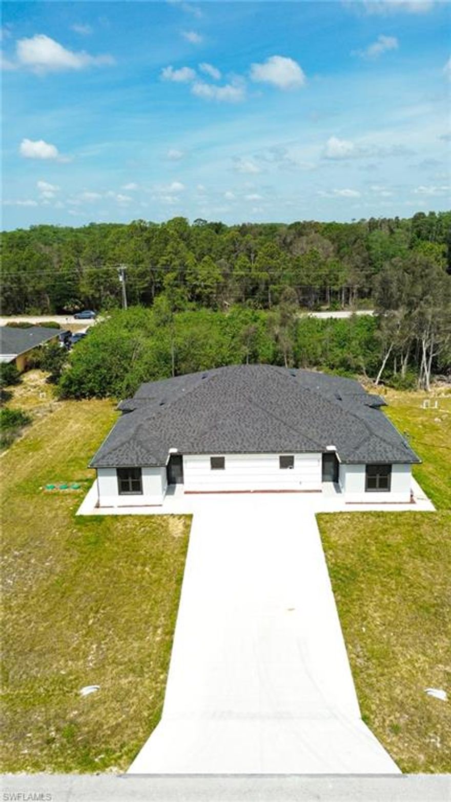 New construction duplex with fourplex options. The property has 2 Unit.Each with 3 bedroom and 2 bathroom. Each one with full Kitchen PLUS utility kitchen in each unit (so technically 4 kitchens)