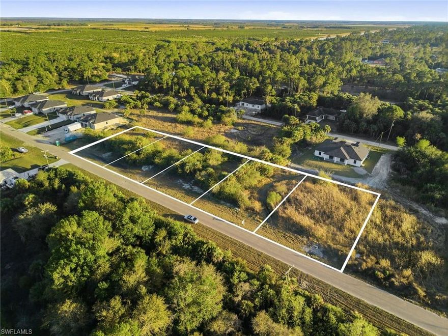 Exceptional 1.15-acre development opportunity in Southeast Lehigh Acres. This oversized parcel consists of five combined lots and is zoned RM-2, allowing for duplex construction in addition to single-family residences. A rare chance to secure scale, flexibility, and income potential within one acquisition. Strategically positioned with paved road access and close proximity to SR-82, this property offers convenient connectivity to Fort Myers, Southwest Florida International Airport, shopping, dining, and expanding commercial corridors. The configuration and zoning create strong potential for multi-unit development or a thoughtfully designed residential compound. No HOA. No deed restrictions. A compelling opportunity for builders, developers, and investors seeking long-term growth in a rapidly developing market.