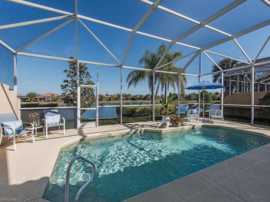 H.12543 OWNER SAYS SELL! REDUCED  LOWEST PRICE OAKMONT HEATED POOL AND LARGE  LAKE VIEW!  features new screening for the dramatically lit in-ground pool with fountains that overlooks one of the widest lakes in the community. Property features and upgrades include: New Scraped wood flooring in the living area and entry, 7 fans located throughout the entire house and lanai, beveled glass front door with custom front screen enclosure, and dramatic exterior lighting. Spacious open concept great room includes a kitchen with breakfast bar and grand mirrored built in.  The Master Suite offers Large closets with built ins, his and her separate bath and shower areas, and sliders to the large lanai. Verona Walk offers:Guarded gated entry, over 20 miles jogging/hiking trails, lighted tennis, bocce ball, basketball and pickleball courts, community pool, lap pool, children's play area with equipment, and 24/7 fitness center. The Town Center features: post office, restaurant, hair salon, travel agency, gas station, car wash, library, computer center, ballroom, card rooms, business center, and an activities director. Perfectly located short drive to I 75, and Naples and Marco beaches.
