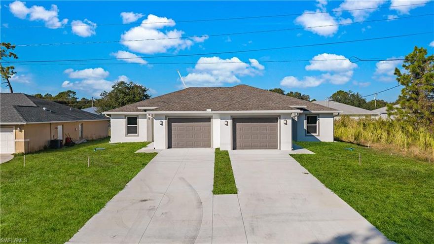 Welcome to an exceptional investment opportunity in the heart of Lehigh Acres! This newly constructed duplex offers the perfect pathway to building long-term wealth, featuring two spacious units each with 3 bedrooms, 2 bathrooms, and a one-car attached garage. Step inside to discover modern living at its finest tile flooring throughout, an open-concept kitchen with granite countertops, shaker cabinets, and a large island ideal for hosting and everyday convenience. The primary suites feature a sleek walk-in shower with floor to ceiling tile, adding a touch of luxury to each unit. Outside, enjoy a private patio and a generous backyard, perfect for barbecues, family gatherings, or tenant enjoyment. With NO HOA, flexible living options, and easy access to SR-82 for quick travel to Fort Myers, this property is ideal for investors, house hackers, or homeowners seeking additional income. Live in one side, rent the other, or rent both the possibilities are endless with this turnkey duplex!