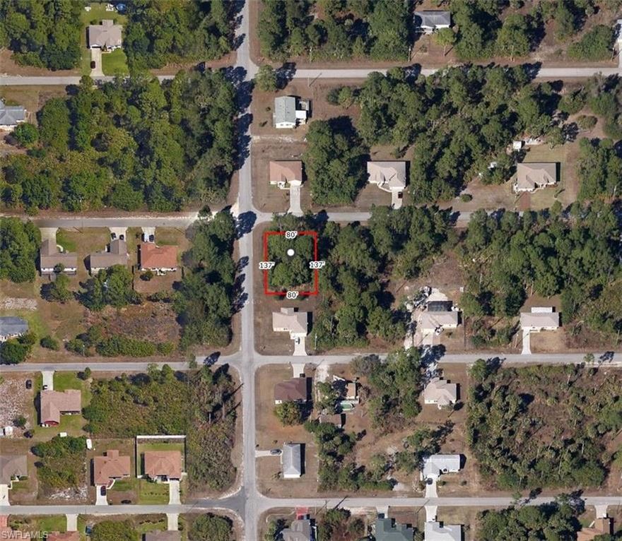 Prime single-family CORNER LOT just off Lee Blvd in Lehigh Acres! Located on a paved road with electricity, surrounded by new construction homes in a fast-growing area. Quiet street (not on a main road) with easy access to Fort Myers, shopping, and schools. Ready to build. NO HOA!
