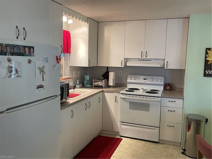 Location, Location, less than five miles to the Sandy Beaches' of The Gulf Of Mexico.    This Furnished home is located in the Sought after Imperial Bonita Estates where the Residents Own and Control The Community.   If your Looking for Activates?   This community will Keep you active,  everything from Bingo to Tennis.   Schedule your Personal Showing today before this one is gone.