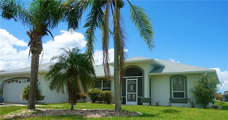 Great central location on this south facing Gulf Access pool home in SE Cape Coral. This home features and updated kitchen with shaker cabinets, breakfast bar and granite counters and it opens to a great room design so it is ideal for entertaining. The home has a new roof in 2023, new A/C and has C-pvc plumbing. This has been a successful seasonal rental property but currently has not scheduled rentals so it is ready for your occupancy and is "Turnkey Furnished". The great room floor plan with its extensive sliders spanning the entire waterfront, offers a light open feel. Roof and A/c have been permitted and per the seller, this location does not require flood insurance due to elevation. Come and get your own piece of paradise.