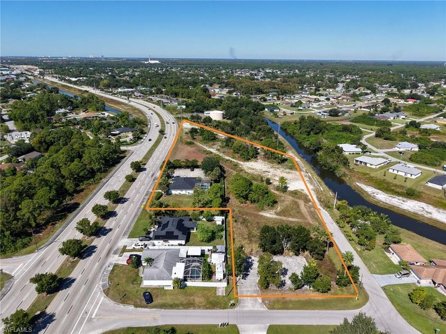 Prime 2.2-Acre CPD Site with Massive Road Frontage, previous model home/office & Multiple Access Points — 5106 Lee Blvd, Lehigh Acres Offering Size: ±2.20 acres (7 parcels)
Frontage: 450+ ft on Lee Blvd with three (3) road frontages — extremely high visibility & access. Existing Building: One-story structure (built 2006) currently configured as office / model home / builder’s suite. Zoning: CPD – Community Planned Development (Model Office) — highly flexible for redevelopment or repositioning.
Why This Asset Works for Investors, Developers or End-Users
• Exceptional road exposure: 3-way frontage puts your site front-and- center for branded tenants, users, or flex-use.
• Flexible use scenario: Existing building and parcels provide near-term income potential while executing a longer-term development vision.
• Redevelopment upside: With CPD zoning, you’re positioned to evaluate alternative uses beyond traditional office.
• Owner/User friendly: Whether you wish to occupy, hold, lease out, or build to suit — this asset provides optionality. Permitted Uses Under Approved CPD
The CPD allows a wide variety of uses, giving you full latitude to choose the higher-value path:
• Accessory uses and structures • Assisted living facility • Business services (Group I only) • Essential services • Medical office • Parking lot (accessory). Personal services (Groups II & IV — excluding health clubs/spas, massage parlors, Turkish/steam baths, escort services, tattoo parlors). Repair shops (Groups I & II — excluding gunsmiths or taxidermists) • Signs, in accordance with LDC Chapter 30 This breadth means you can position the site as anything from a medical office campus to an assisted-living boutique or business services hub — or hold the land and wait for highest use .Target Strategies Investor / Income Strategy: Acquire, stabilize the existing building as an office tenant, hold the land for future repositioning. • Lease to a credit user now, capture rent while waiting on value-add redevelopment. Developer / Value-Add Strategy: Redevelop the site into a medical office park, assisted-living facility,  — take advantage of 3 frontages and high visibility. Create standalone parcels, build-to-suit for specialty users w/ signage presence. Occupy the existing building for base operations, expand onto the remaining acreage. • Leverage the land for future growth, parking expansion, tenant income or affiliate offices. 2.2 acres • 450+ ft frontage on +2 additional road frontages — exceptional ingress/egress. Situated in the growth corridor w/ demand for medical, business-service uses. Existing building provides immediate cash flow or owner-occupier occupancy, mitigating land-only carry risk. CPD zoning flexibility. Contact me today.