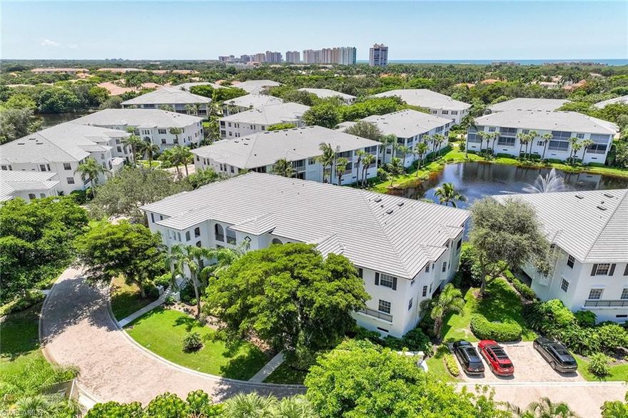Bright cheerful top-floor Breakwater condominium with a beautiful lake view. Lovingly maintained, the three-bedroom condominium with a split floor plan for maximum privacy, soaring ceilings and plantation shutters is being offered turnkey furnished. Offering electric storm shutters and a new roof. The building elevator lands directly on the ground level, where you will find an oversized two-car garage with extra room for storage. Pelican Bay residents can enjoy a wide variety of amenities, including world-class beaches with chair service and beachfront dining, fitness, tennis and miles of protected nature trails. Breakwater also has a private pool for residents and is minutes to the best entertainment, dining and shopping at Mercato, Artis—Naples and Waterside Shops.