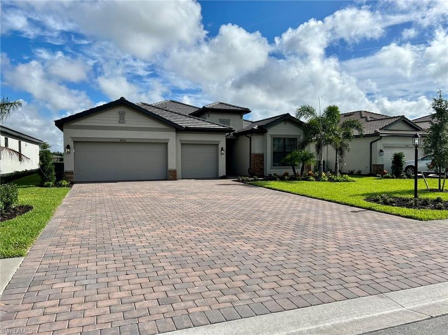 NO BIDDING / WAIT TIMES! This Sought after Summerville II floor plan located in The New Verdana Village with tons of upgrades. Is less than a month old and offers premium lake views. Spread out over almost 2445 sqft there are 3 bedrooms plus den/office, 3 full bathrooms. This smart home offers a large pavered driveway to a 3 car garage with a white kitchen with premium applicances, premium quartz countertops in kitchen and bathrooms, tray ceilings, oversized master shower, backyard private pool and spa screened in facing North for  a perfect afternoon pool day. Views over the beautiful maintained lake each evening with tons of wildlife. This community will provide a resort style pool, including private cabanas, indoor/outdoor bar and restaurant, poolside service, adult only craft bar, indoor / outdoor tennis courts , indoor / outdoor pickle ball , indoor / outdoor basketball courts, and one 24 hour manned guard gate. Low HOA fees include lawn care, irrigation.