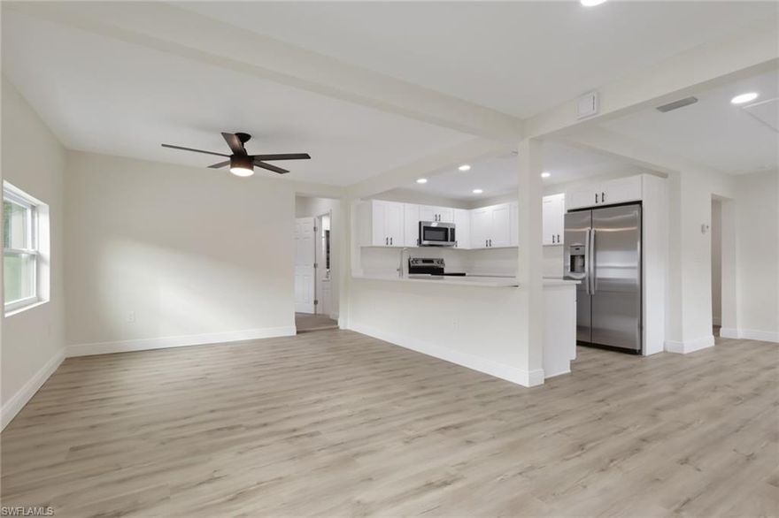 Welcome to 26630 Noble Ln in Bonita Springs, a thoughtfully and completely remodeled 3-bedroom, 2-bath home that blends modern updates with inviting Florida charm. The interior features a brand-new kitchen with updated cabinetry, countertops, and appliances, new flooring throughout, and beautifully renovated bathrooms designed for comfortable everyday living. A cozy fireplace adds warmth and character to the main living area, creating a perfect focal point for relaxing evenings or entertaining guests, while the new A/C system provides year-round comfort. The well-designed layout offers flexible living spaces ideal for guests, a home office, or seasonal use. Located just minutes from the revitalized Downtown Bonita Springs along Old 41, you’re close to local shops, dining, and community events, with easy access to Bonita Beach, Barefoot Beach, Naples, and Southwest Florida International Airport, making this move-in-ready home an excellent choice for full-time living, a winter retreat, or an investment opportunity.