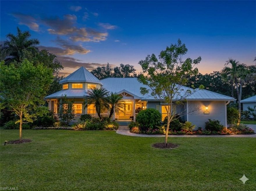 Where Coastal Ease Meets Timeless Character! 
Coconut Creek’s charming Key West flair blends beautifully with a touch of Victorian-inspired character, creating a home that feels both coastal and quietly distinctive. From the moment you arrive, there’s an undeniable sense that this is something special. The welcoming front porch draws you in, setting the tone for a home that feels peaceful, warm, and thoughtfully designed.

Inside, the home opens into a bright and inviting great room that connects naturally to a beautifully renovated kitchen. Thoughtfully designed for everyday living, the kitchen features elegant cabinetry with upper and under-cabinet lighting, quartz countertops that continue seamlessly into the backsplash for a clean, cohesive look, stainless steel appliances, a pantry, and a comfortable breakfast bar for casual dining.

At the front of the home, a truly standout feature awaits—a distinctive rotunda-style dining room that elevates every occasion. Surrounded by a ring of windows and crowned by soaring ceilings, this space is filled with natural light and architectural charm. It feels refined yet welcoming, offering an intimate setting without ever feeling enclosed—perfect for hosting holidays or enjoying quiet, meaningful dinners.

The primary suite is a private retreat, complete with French doors leading to the lanai and a beautifully appointed bath featuring dual vanities, a spacious walk-in closet, a tiled walk-in shower, and a separate soaking tub designed for unwinding at the end of the day. Guest bedrooms are thoughtfully positioned on the opposite side of the home, offering comfort and privacy, and share a beautifully updated pool bath with a tiled shower.

Everyday functionality is just as well considered, with a spacious interior laundry room complete with a utility tub and a convenient side-load garage.

Step outside and the lifestyle truly unfolds. A charming back porch with an outdoor kitchen invites relaxed evenings and easy entertaining, while steps lead down to a heated saltwater pool with a cascading spa and waterfall. Surrounded by lush, tropical landscaping and a privacy fence, the backyard feels like your own secluded retreat—peaceful, private, and designed for relaxation.

The home was beautifully renovated in 2023, including a stunning new kitchen, rich ¾-inch wood flooring throughout, a new AC system, and a new hot water heater. A metal roof adds both durability and character, and for added peace of mind, the home is equipped with both electric and manual roll-down shutters.

Located just minutes from Sanibel Island and Fort Myers Beach, this home offers not just a place to live, but a lifestyle rooted in beauty, comfort, and connection to everything that makes Southwest Florida so special.
