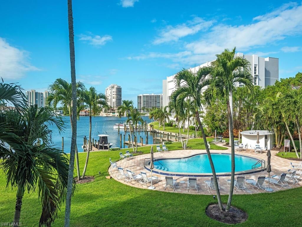 Photo of 400 Park Shore DR #303, NAPLES, FL 34103 (MLS # 224092975)