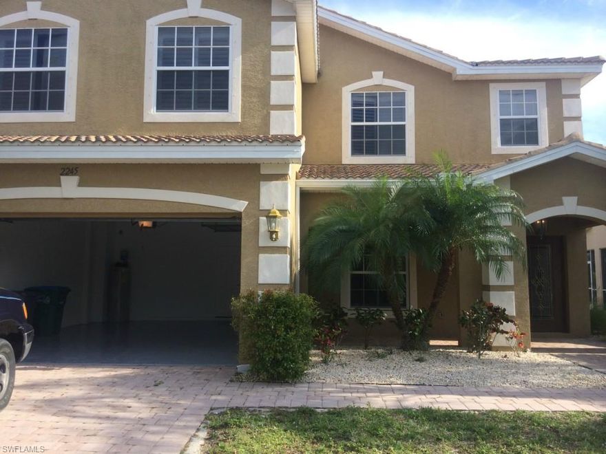 This lovely 2 story Heathwood Lakes home has 4 bedrooms and 3 baths with almost 3000 sq. ft. of living space. Located in one of the few gated communities in Cape Coral. There is plenty of room to spread out in this quality built home.  Check out how large the backyard is WOW!!!!  Totally freshened up and ready for your busy family to move right in!  Beautiful glass double entry doors, 18" tile on the diagonal and plantation shutters are a few of the appointments this home features.  Cook's kitchen with center island, 42" wooden cabinets and solid surface Corian counter tops.  All brand new kitchen appliances in stainless steel, new washer & dryer too, this home is move in ready! Conveniently located to schools, shopping and restaurants. The community offers a pool with cabana, playground and security.