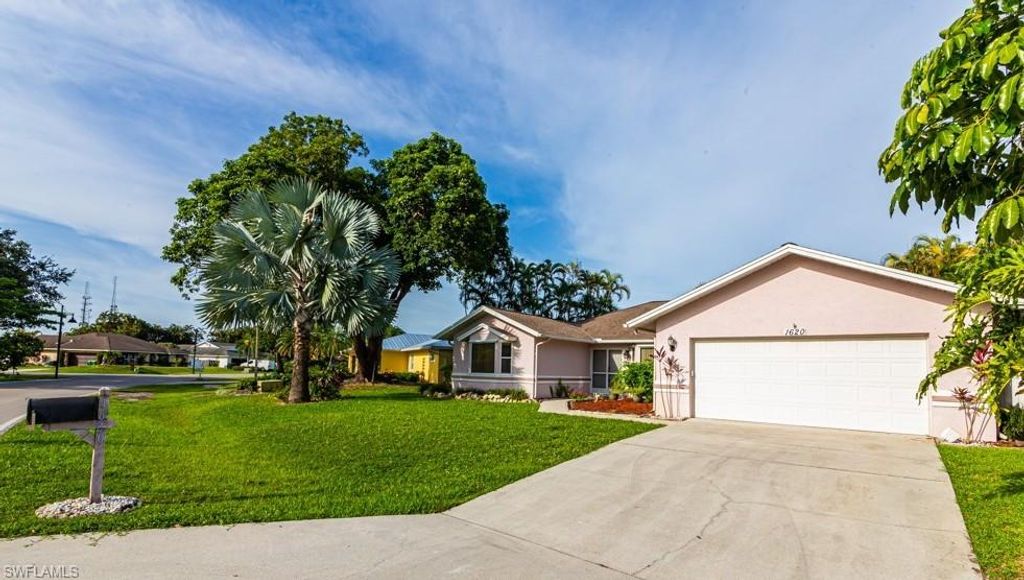 Photo of 1620 Forest Lakes BLVD, NAPLES, FL 34105 (MLS # 226015367)