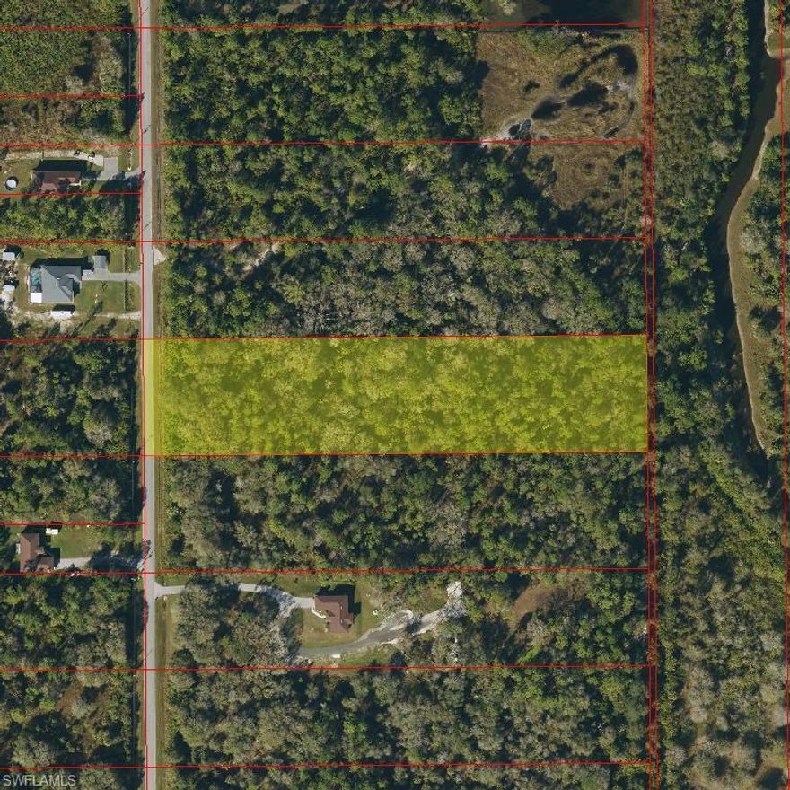 Expansive 3.21-acre parcel in established Golden Gate Estates offering exceptional privacy and a natural wooded setting. This property features abundant native vegetation and mature canopy, creating a serene sanctuary for your custom estate home.