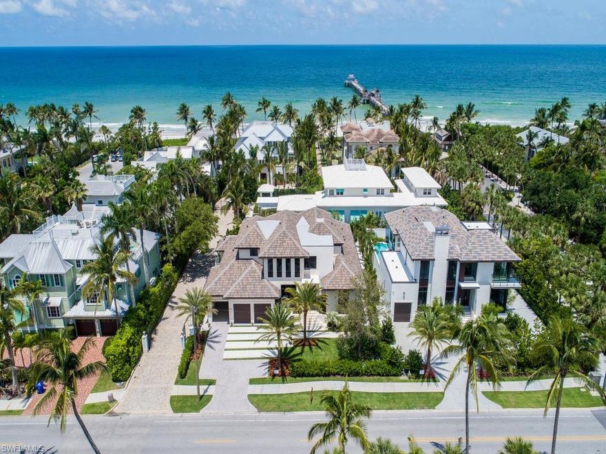 Ideally positioned just footsteps to the most iconic structure in Naples, the Naples Pier and beach, and a 2 minute walk to charming Third Street South shops and fine dining. Just completed by SGM Building Group, this Stofft Cooney designed Bali-infused home offers a fabulous great room plan featuring 4 bedrooms, a den and media room. The use of natural stones, light and dark woods, stainless steel accents, walls of sliding glass doors from the living areas and master bedroom open to the Zen-like outdoor living and entertaining area with beautiful tropical landscaping and great privacy. Lushly landscaped promenades and courtyards are lined with charming and historic architecture in the Third Street South shopping district just across the boulevard. The latest in couture design, fine art, and creative flair from around the world are yours to enjoy.