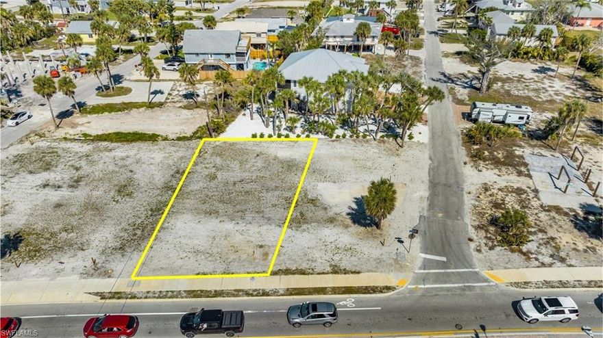 An Incredible Opportunity to Build an Estero Blvd Gulf View facing ELEVATED Beach Home is RIGHT HERE.  Zoned for SHORT TERM rentals, this property presents a HIGH POTENTIAL FOR HUGE GROSS INCOME. This PRIME Ocean View vacant lot, measuring 50 x 100, offers breathtaking views and is perfectly situated for your dream ELEVATED BEACH HOME. Or take advantage of the ASSEMBLAGE OPPORTUNITY OF ADJACENT PARCELS for your DREAM Development (4 Total parcels: See schematics lot lines in Pics attached ): 111 COCONUT DR, 4151 ESTERO, 4109 ESTERO, 96 HERCULES DR. MULTIPLE BUILDER INTRODUCTIONS ARE AVAILABLE, RENDERING SELECTIONS AND FLOORPLANS. Imagine waking up to the sound of waves crashing and strolling along the beach with your coffee for sunrise. TWO BEACH ACCESSES TO CHOOSE FROM ACROSS THE STREET. With its coveted location directly across from the beach, this lot promises endless possibilities for building the vacation rental or beach home of your dreams. COCONUT DR DOCK and DIRECT BEACH ACCESS makes this parcel highly desirable. Convenience is key, as this property is just a stone's throw away from amenities such as Publix, the marina, and shops, ensuring that everything you need is within easy reach. Whether you're envisioning a luxurious beachside retreat or a lucrative rental property, this lot offers the perfect canvas to turn your vision into reality. Don't miss out on this rare chance to own a slice of coastal paradise. Build your dream home and start living the coastal lifestyle you've always dreamed of. Welcome to your opportunity to own a piece of paradise! Listing Price shown is ONLY for 4151 Estero Lot with NO HOME .  Assemblage pricing information available upon request.