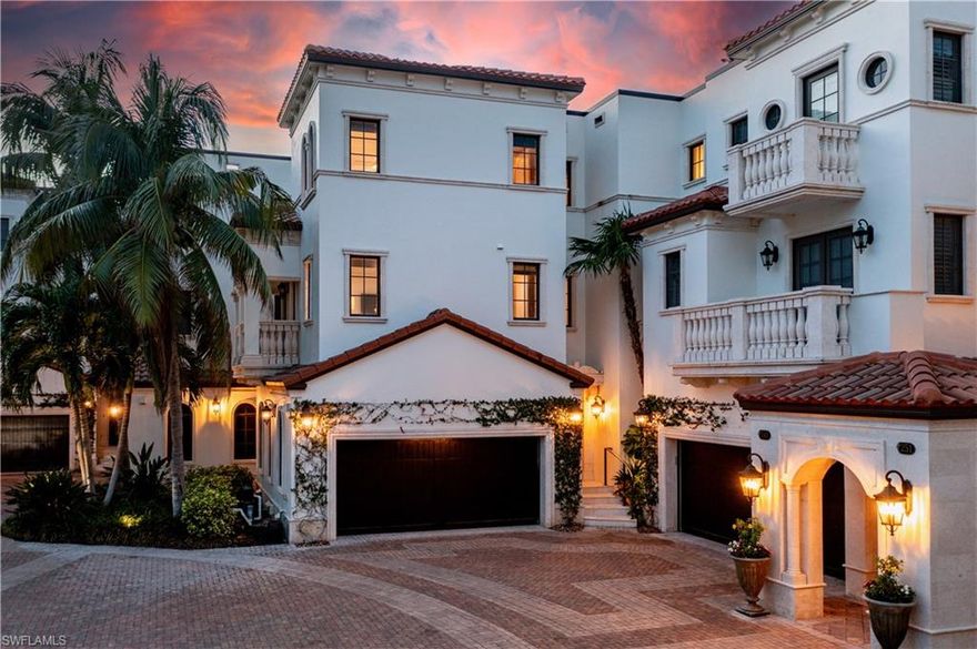 Discover luxury living at 231 Harbour Drive in this completely remodeled, three-story waterfront villa on Moorings Bay. Located just minutes from Gulf Shore Blvd’s beaches and the exclusive Moorings residents’ private beach park, this exceptional tri-level townhome is part of an intimate, gated community with only eight residences. A gated entrance leads to a paved motor court accented with elegant fountain & landscaping. Inside, the grand entryway with a custom staircase sets a sophisticated tone. The ground level offers a welcoming living space with a custom wet bar, laundry room, and guest bedroom or den with an en-suite bath. This level opens to the summer kitchen, pool and spa area.  On the main floor, a fully remodeled chef’s kitchen features a Wolf gas range, SUBZERO side by side refrigerator, island, breakfast bar, open display shelves, walk-in pantry, and custom cabinetry. The family room and dining area open to a spacious, covered lanai on the second level, creating a seamless flow for indoor-outdoor living. Custom feature wall with a fireplace, a TV area, and an additional bar makes this level perfect for entertaining. A luxurious guest suite with a walk-in closet and en-suite bath also graces this floor. The top level is dedicated to the owner’s suite, featuring a seating area, built-in desk/vanity, window seat, and abundant natural light, creating an ideal reading nook. The spa-like bathroom offers a double vanity, floating soaking tub, and seamless glass-enclosed shower. An additional guest suite on this level provides an inviting space for family or friends. Throughout the home, shell-stone marble flooring and hardwood flooring adds a touch of elegance, while expansive wrap-around water views capture both sunrise and sunset views.  The property includes a private 42’ boat slip for jet skis or kayaks, a two-car garage, all-on/off lighting system, and “lock-and-leave” convenience. With close proximity to Moorings Golf & Country Club, Venetian Village shops, and Naples’ beautiful beaches, this villa offers the security and ease of a private retreat in Vista Royale.