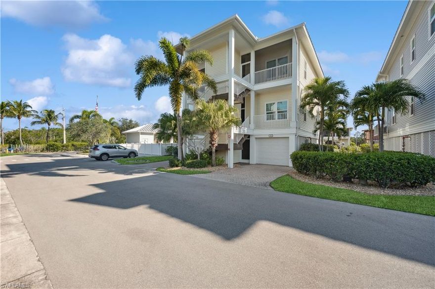 Direct Access waterfront residence includes a 34' BOAT DOCK with a new 10,000-pound lift! This 2 bedroom 2 bath top floor unit presents an exceptional opportunity to live in the cool/funky/artsy/hip/fun town of Goodland. The open floor plan is flooded with natural light and features a beautiful new kitchen with a huge stone-topped accent-colored island. The Shaker-style cabinets and tile backsplash are simply beautiful. The coastal-designed furniture is a perfect match for the laid-back Goodland atmosphere. An elevator is shared by just you and the neighbor below to bring you to your island paradise. A 3+ car garage with enclosed storage lets you have all the necessary toys. The high ceilings and great use of space within the unit add to its livability. The master bedroom is very large and features a big walk-in closet. Sit on your lanai and enjoy the waterfront view while you enjoy your favorite beverage. The community pool and hot tub are right next door. It is legal to drive a cart on the public streets of Goodland. Goodland has some of the finest dining and world-famous entertainment establishments including Stan's and the Little Bar. You are two minutes from Marco Island and it's shopping and sugar sand beaches. Hurricane windows and doors plus the high elevation give you peace of mind. New AC in October 2024.