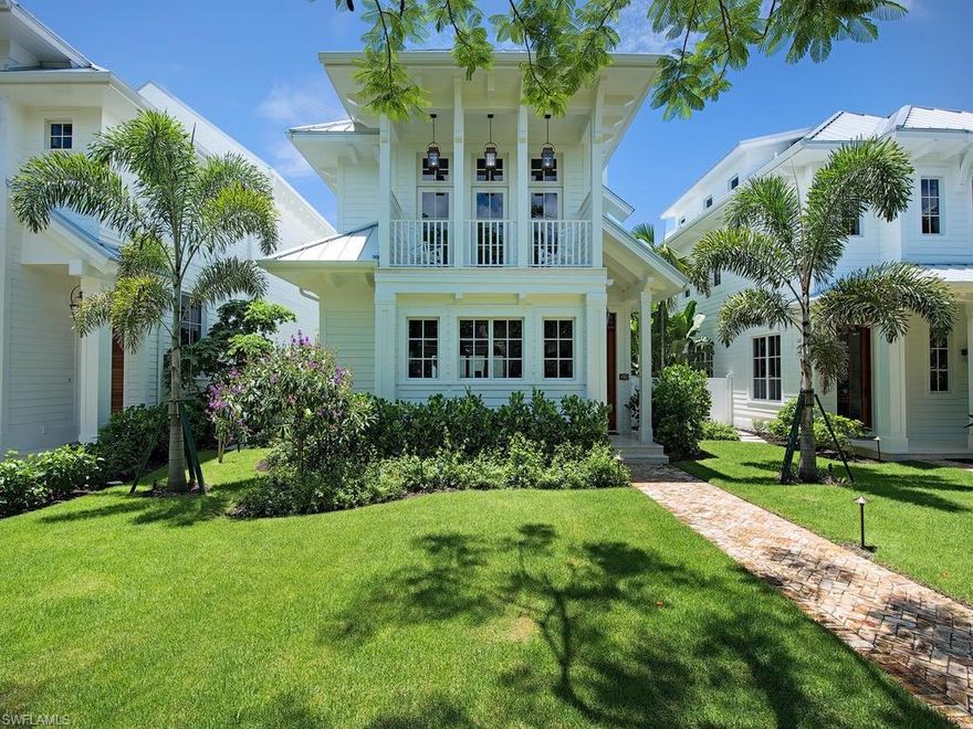 For the discerning homebuyer searching for the unique among the usual, this new construction Old Naples home combines sophisticated downtown appeal with the best in modern luxury and abundant coastal ambiance. Compellingly finished and offered professionally furnished, no expense was spared in the design and completion of this 4-bedroom, 4 ½-bath home, steps from the beach and the award-winning shops and restaurants of Fifth Avenue South and Third Street South. Exposed brick and metal accents are balanced aesthetically by richly grained wood flooring and tray ceiling detailing on the first level. All fixtures and finishes throughout are top-of-the-line. The striking kitchen features Ruffino cabinetry, a Titanium Leather Granite backsplash, Caesarstone countertops, a Wolf 6-burner gas range, Sub-Zero freezer, refrigerator, and wine cooler, and ample additional must-see elements. From your private courtyard pool and spa to your rooftop deck, enjoy the best in Naples living, with extras including a glass elevator, fireplace, and 2-car garage contributing to your day-to-day ease and comfort. A one-of-a-kind opportunity in a singularly desirable location. A fantastic KW Designed home!