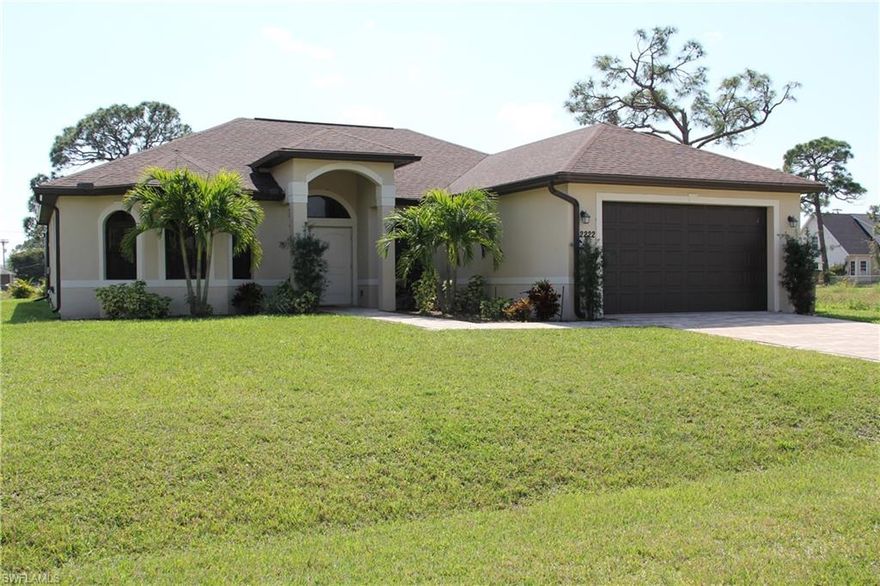Beautiful home is like new construction!!! Built in 2016 with all of the modern touches you could expect with a brand new home in SW Cape Coral. Custom designed pool spans nearly the entire width of the home and features a brick paver deck! As you enter the home you will notice large open areas with lots of light. Beautiful kitchen with wood cabinetry, granite counter tops and stainless appliances. Great room overlooking the pool area has a trey ceiling and large tiles laid on the diagonal. Family and formal dining area for entertaining guests. Master suite with dual sinks, walk in shower and soaking tub. So many lovely things about this home come see it for yourself today!