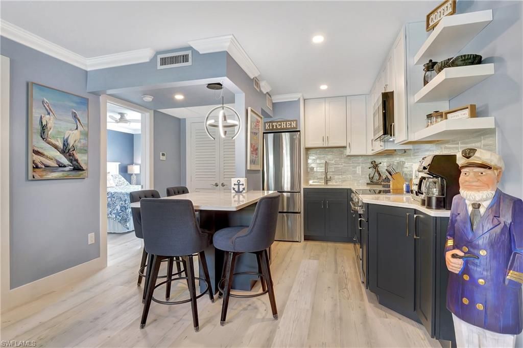 Photo of 1295 Gulf Shore BLVD S #136, NAPLES, FL 34102 (MLS # 225051947)