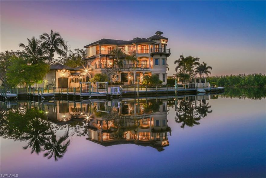 BE SURE TO LOOK AT THE VIDEO TOUR: Armada Court is the Crown Jewel of Cape Harbour. This one-of-a-kind estate was designed with the yachtsman in mind. Minutes to the Intracoastal Waterway and the gulf of Mexico beyond. The home boasts over 18,000 sq. ft. The compound features the main house, guest cottage, caretaker's quarters, 6 bedrooms, 6 full baths, 3 half baths, 3 fireplaces, an entertainment level, gourmet kitchen, outdoor kitchen, wine loft, library, gated entrance and reading loft. A waterfront promenade with beach entry vanishing edge pool with spa, fire place and breath taking views. The estate can accommodate up to 7 cars with one bay 42 feet deep. Property is 1.5 acres, 4 lots, landscaped grounds overlooking almost 600 ft seawall. With plenty of room for multiple 70 ft. yachts. Home has Crestron digital control panels and latest technology digital camera security system. 2 Vacant lots surround the house which could be sold separately or not purchased with the house.