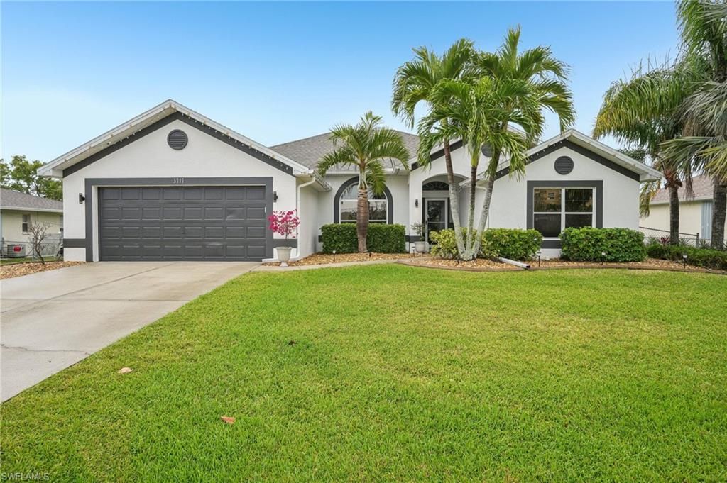 Photo of 3717 Agualinda BLVD, CAPE CORAL, FL 33914 (MLS # 226019931)