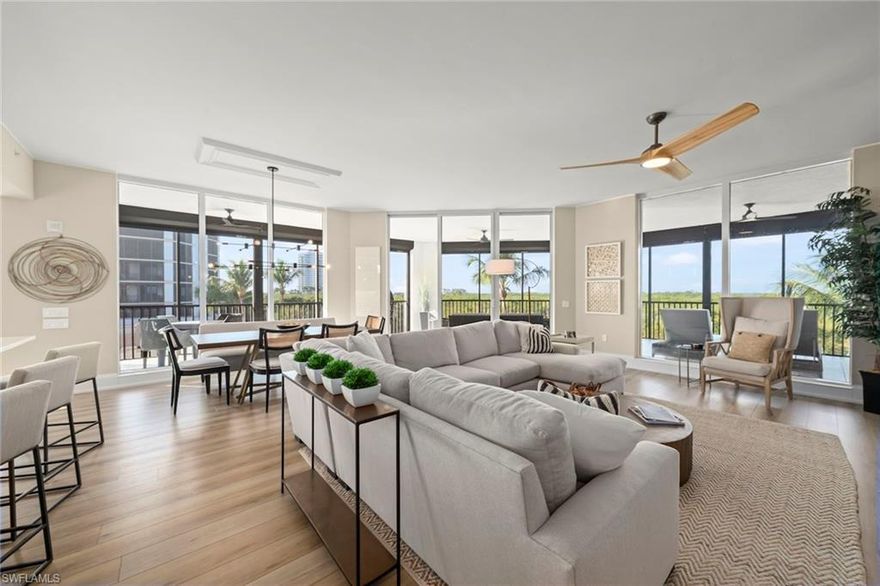 This fully renovated, second-floor end residence in Castella at The Colony presents a refined alternative to Gulf-front high-rise living, offering luxury finishes, privacy and ease of ownership, paired with exclusive access to The Colony’s private Bay Club on Estero Bay. Thoughtfully redesigned with elevated architectural detailing and high-end materials throughout, the residence is filled with natural light enhanced by its desirable corner location. The open living and dining areas flow seamlessly, creating a relaxed yet sophisticated setting ideal for entertaining after a day at the beach. The chef’s kitchen rivals those found in other premier residences, anchored by a striking one-piece quartz sink and countertop and a dramatic waterfall quartz island with three integrated wine and beverage coolers. Professional-grade appliances include a Sub-Zero refrigerator, Wolf double ovens, microwave and induction cooktop, a Zephyr range hood and a Bosch dishwasher, all new in 2020. A touchless faucet, custom lighting and refined finishes complete the space. The primary suite is a serene, spa-like retreat, featuring porcelain countertops and floor-to-ceiling porcelain shower walls in the bath, with a separate luxurious soaking tub, a statement piece, delivering a clean, modern aesthetic inspired by coastal resort living. Throughout the residence, 8-inch floor moldings, custom window and door wall treatments, dimmable lighting, and designer lighting and fans reflect a meticulous attention to detail. Comfort and peace of mind are ensured with dual HVAC systems replaced in late 2022, each enhanced with ultraviolet air purification, along with a Phyn Wi-Fi water shutoff and leak detection system, and full-house hot water circulation for instant hot water. Window tinting on east, south and west exposures enhances energy efficiency while maintaining bright, natural interiors. A new double entrance door installed in 2025 creates an elegant arrival, while curated furnishings from Ethan Allen, Arhaus and Restoration Hardware further elevate the home’s appeal. Castella offers a boutique, resort-style lifestyle with a resort-style private pool with beach entry, fire pit, grills and social pavilion, while ownership in The Colony includes the extraordinary Bay Club, a private sanctuary offering bay front dining, sunset views and concierge-style service. Residents also enjoy Pelican Landing’s private beach island, tennis, pickleball, fitness facilities and optional golf memberships. Ideally moments from Coconut Point’s upscale shopping and dining, and a short drive to RSW International Airport, this exceptional residence delivers the lifestyle buyers desire.