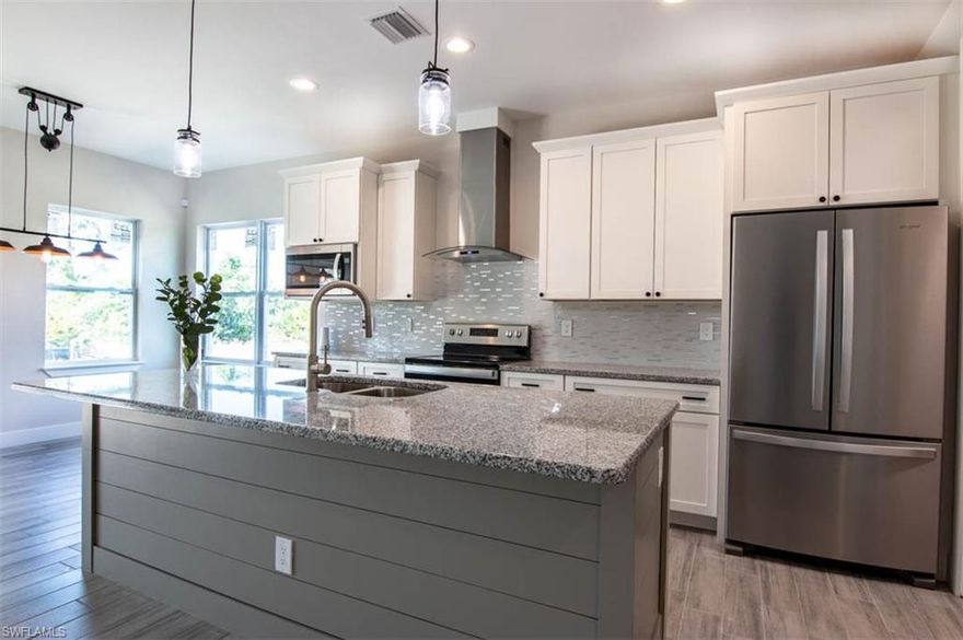 Stunning! Builders own home. Come and see this beautiful quality custom new home built in 2020 by Teutsch Builders South. ALL HURRICANE IMPACT WINDOWS low E energy efficient!!! 8FT. INTERIOR DOORS AND 9.4 AND 12FT CEILINGS!!  High end finishes!! The Home has CUSTOM GOURMET KITCHEN with painted shaker white cabinets with soft close drawers. Stainless appliances with HOOD over range, built in pantry, large GRANITE island and tops, Custom built in MUD ROOM/laundry room, Gray Ceramic wood look floors throughout the home! Large covered lanai with room for a pool. Compare this CUSTOM HOME to the cookie cutter new builds! Located in a desirable boating community!! A highly sought after neighborhood with Oasis elementary school, community park (Jim Jeffers)/soccer fields/tennis/basketball courts/children's gym and school LOCATED IN THE NEIGHBORHOOD and NO HOA fees!! City water and sewer is in!! Burt store boat ramp is only a few blocks away!