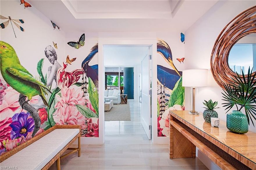 Your beach house awaits! With a private staircase leading directly to the pool and beach, this beachfront residence offers the convenience of high-rise living but the feeling of a home. Completely remastered, this residence features 2,500 square feet of luxurious living providing two bedrooms, two baths, beautiful porcelain floors throughout, loads of storage, all new plumbing and wiring, and all new kitchen and baths with top-of-the-line finishes. Go onto the spacious screened lanai and just a bit further to your private uncovered deck where you can enjoy basking in the sun or watching the sun set at end of the day. Residence being offered fully furnished and ready to enjoy. Seller owns a lobby studio for an additional $475,000.